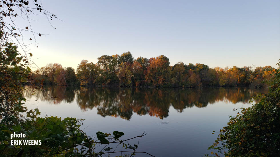 Autumn reflection on waters of the Dutch Gap lagoon