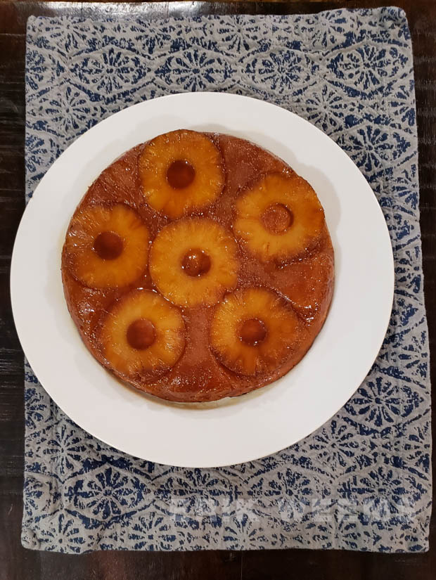 Pineapple Upside Down Cake on white plate Pineapple Upside Down Cake